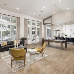 lounge room on wood-style flooring with ample seating
